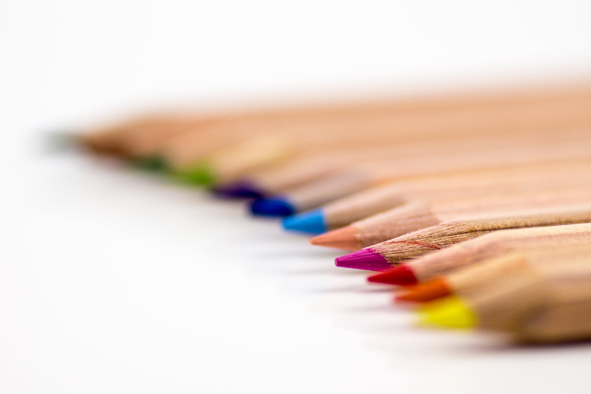 selective focus photography of color pencil lot