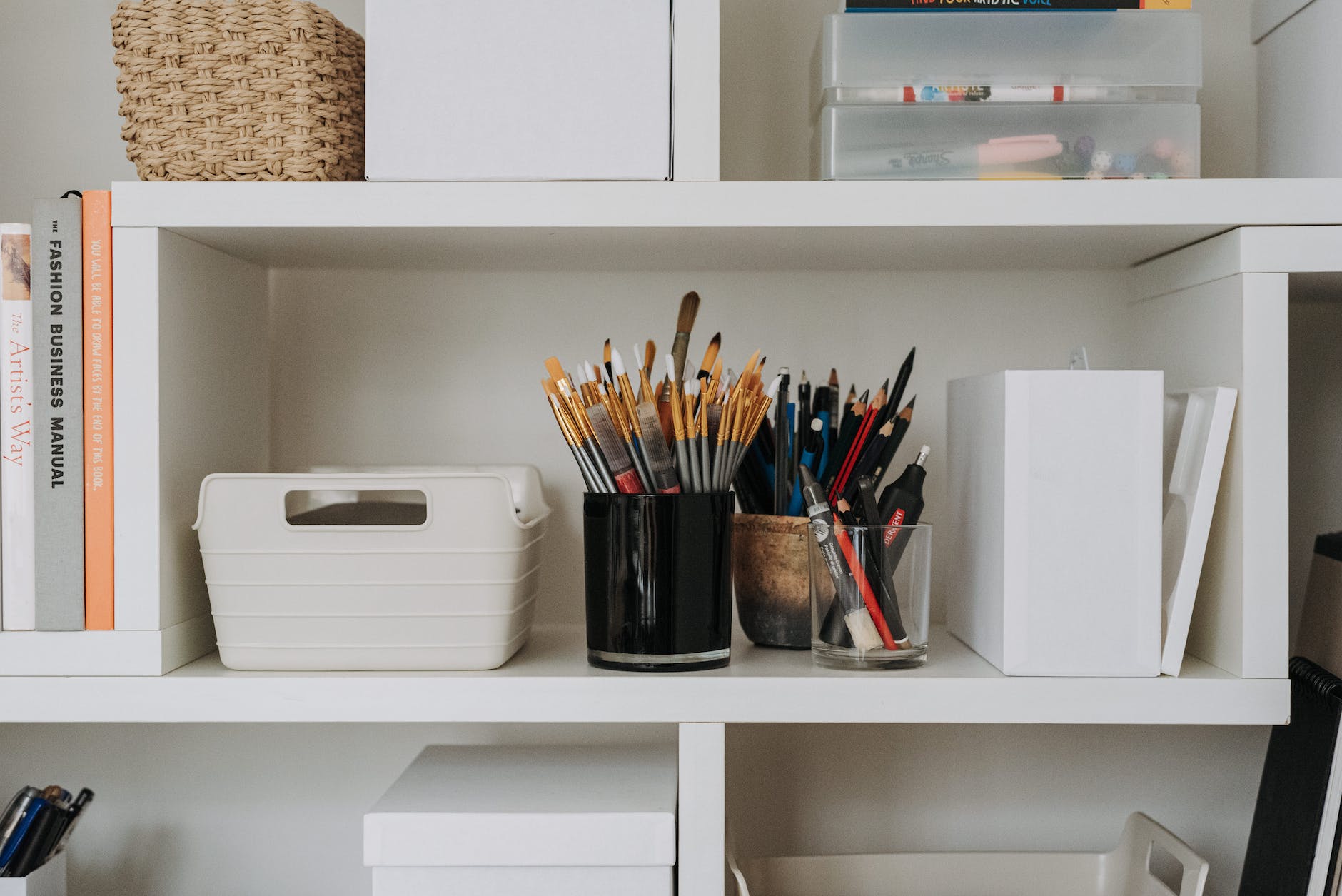 art supplies on shelves in studio